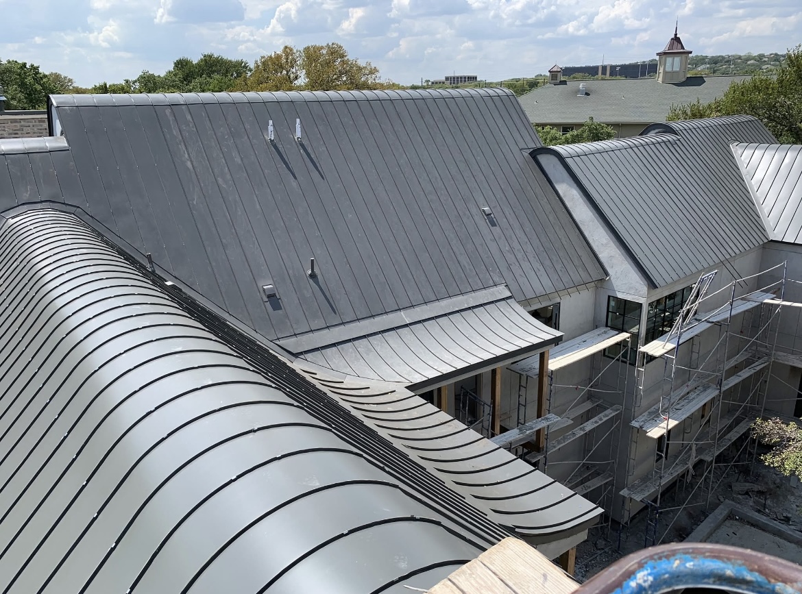 Curved standing-seam metal roof installation, Curved Ridges project